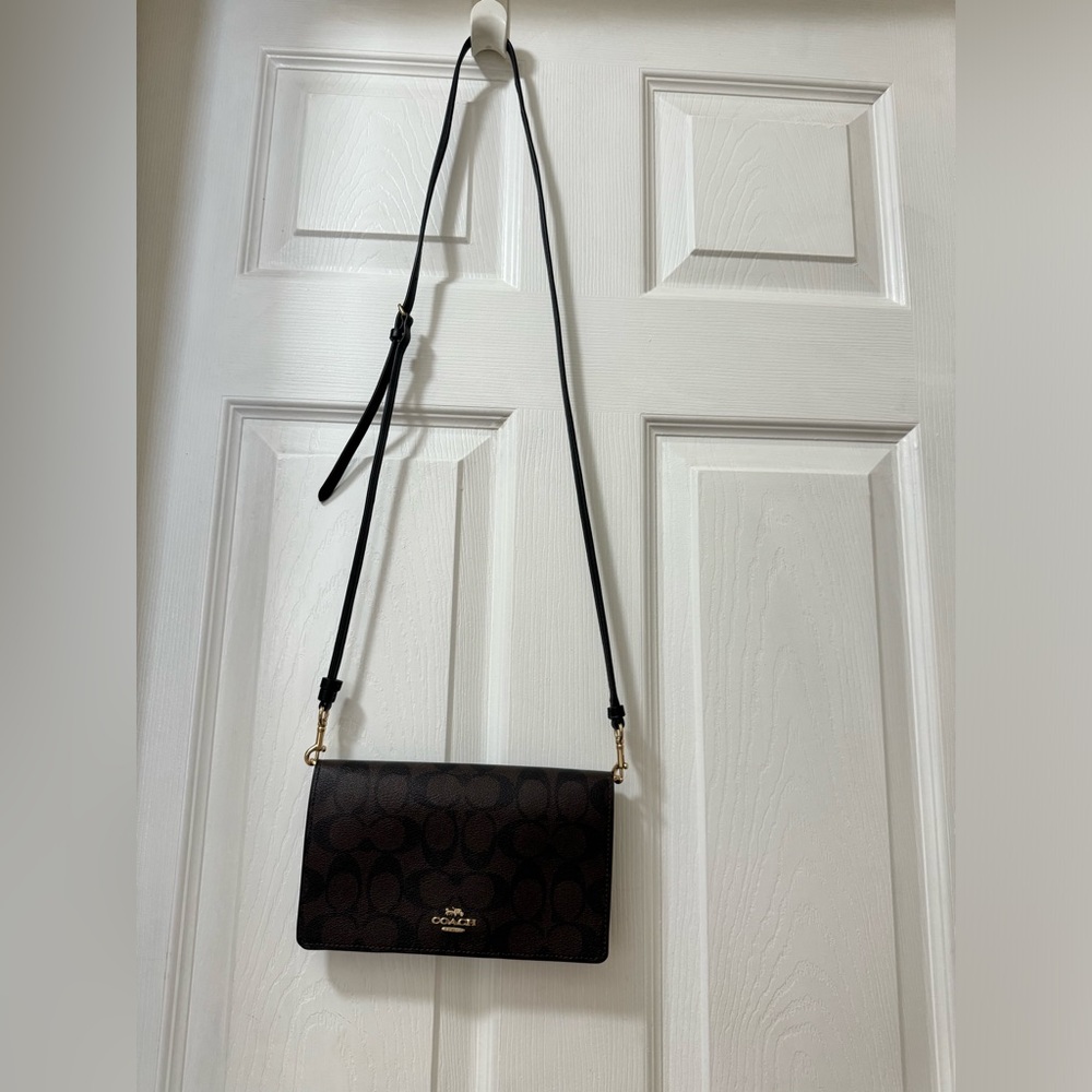 COACH womens Anna Foldover Crossbody Clutch In Signature Canvas